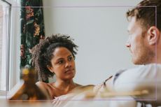 Sexless marriage illustrated by couple looking at each other